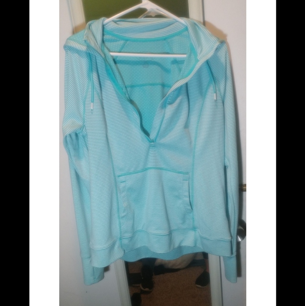 Tangerine half zippered light blue hoodie